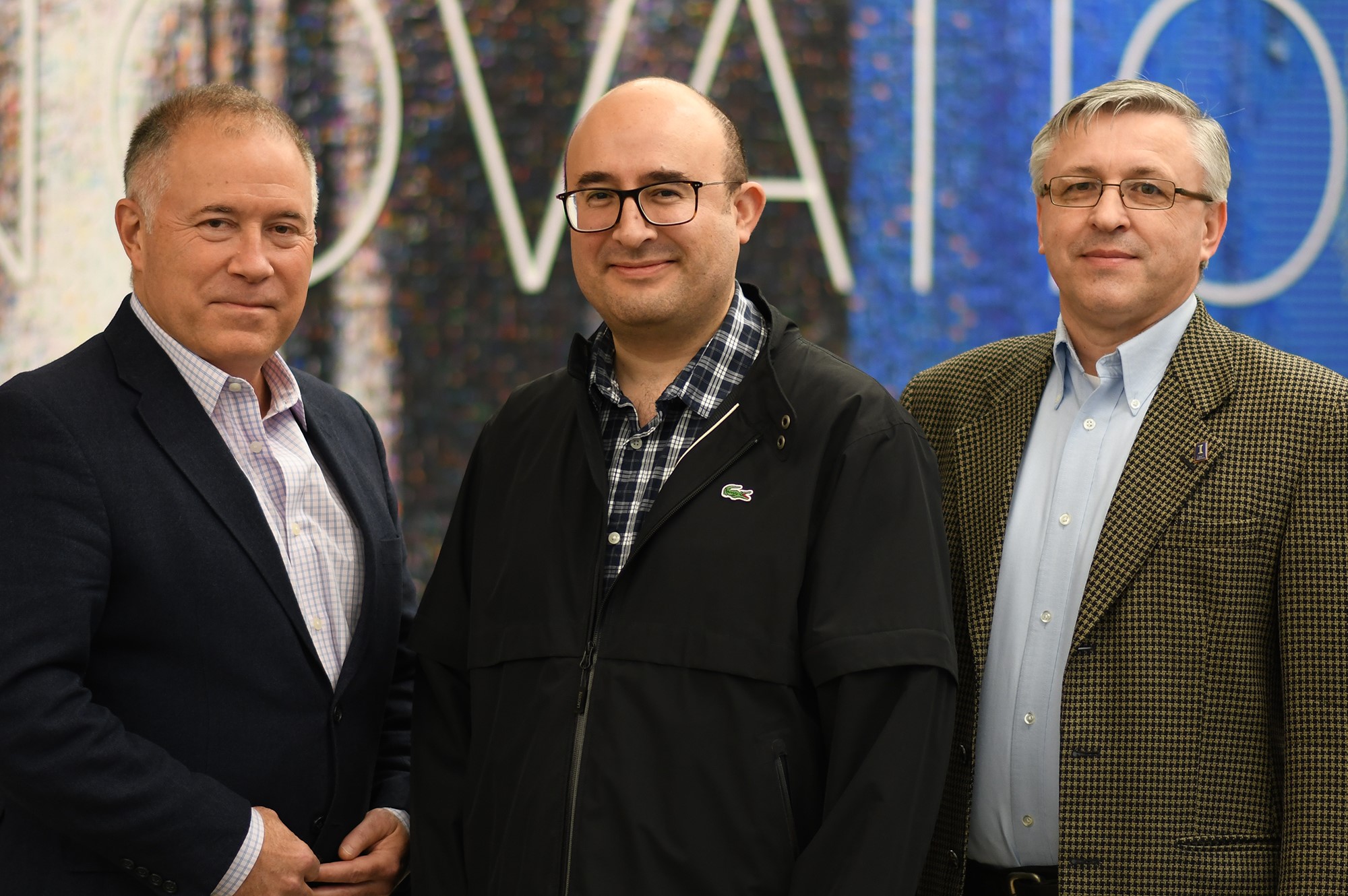Group CAII Leadership Photograph of Brendan McGinty, Eliu Huerta, and Volodymyr Kindratenko