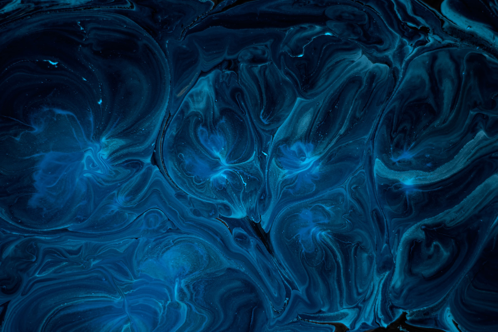 Abstract liquid gradient with cyan and teal on a dark blue background
