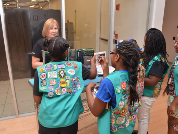 Photograph of a tour with Girl Scouts at the National Petascale Computing Facility