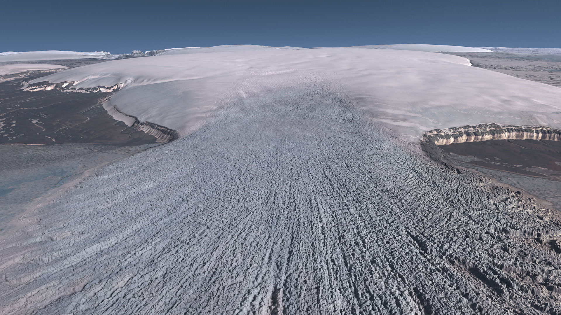 Screenshot from the documentary Atlas of a Changing Earth with an uninhabitable landscape of white snow, grey rocks, and silver glacier caps under a cold blue sky