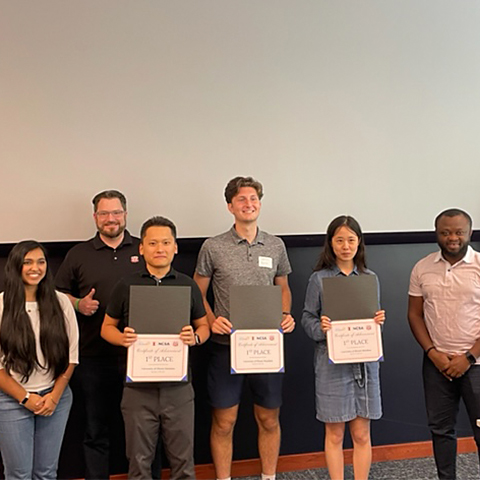 A group photo of first place winners at Alteryx and Phillips 66 Datathon hosted at NCSA.