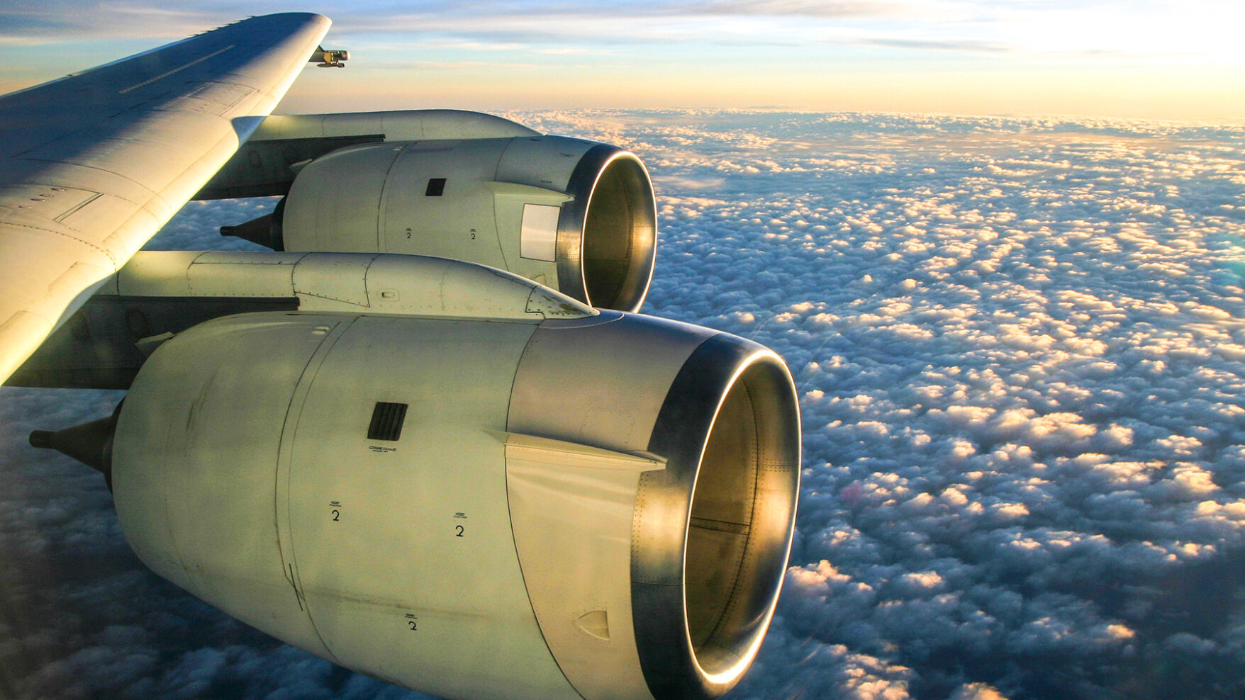A picture of jet engines as seen out of a plane in flight