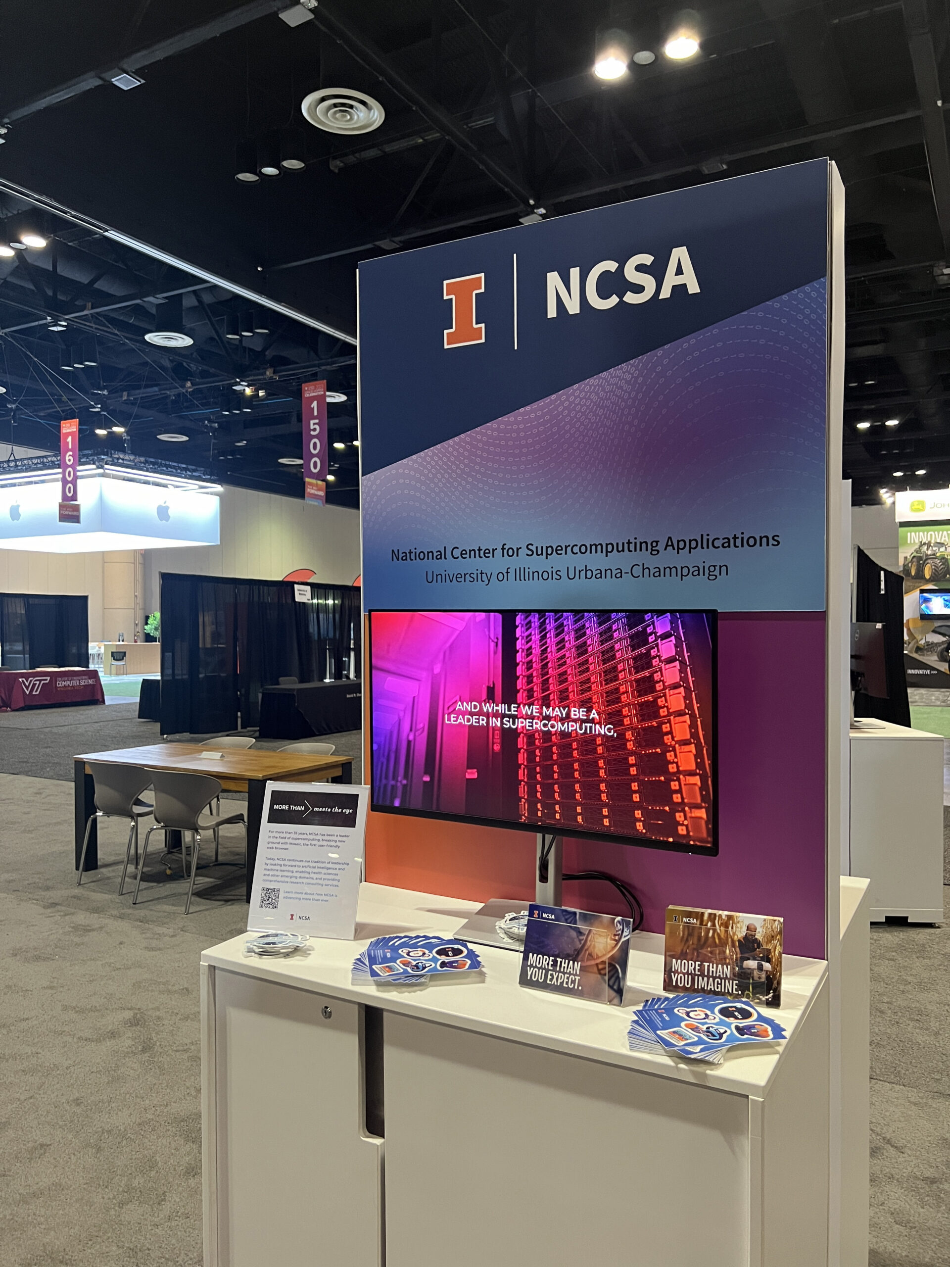 NCSA had a mini booth at Grace hopper. This picture shows the mini booth, with some stickers and handouts for visitors.
