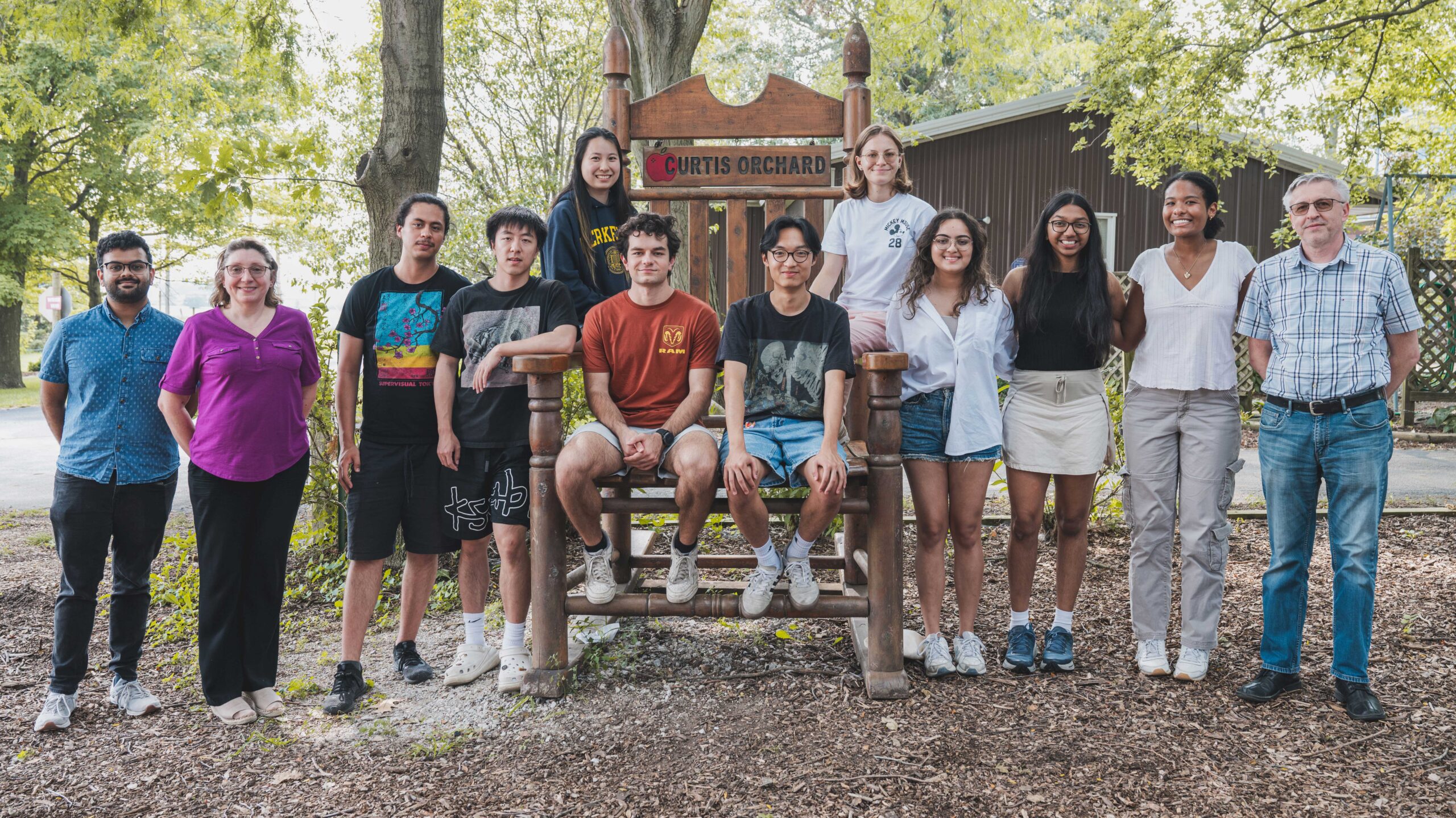 Photo of REU FoDOMMaT students and program administrators