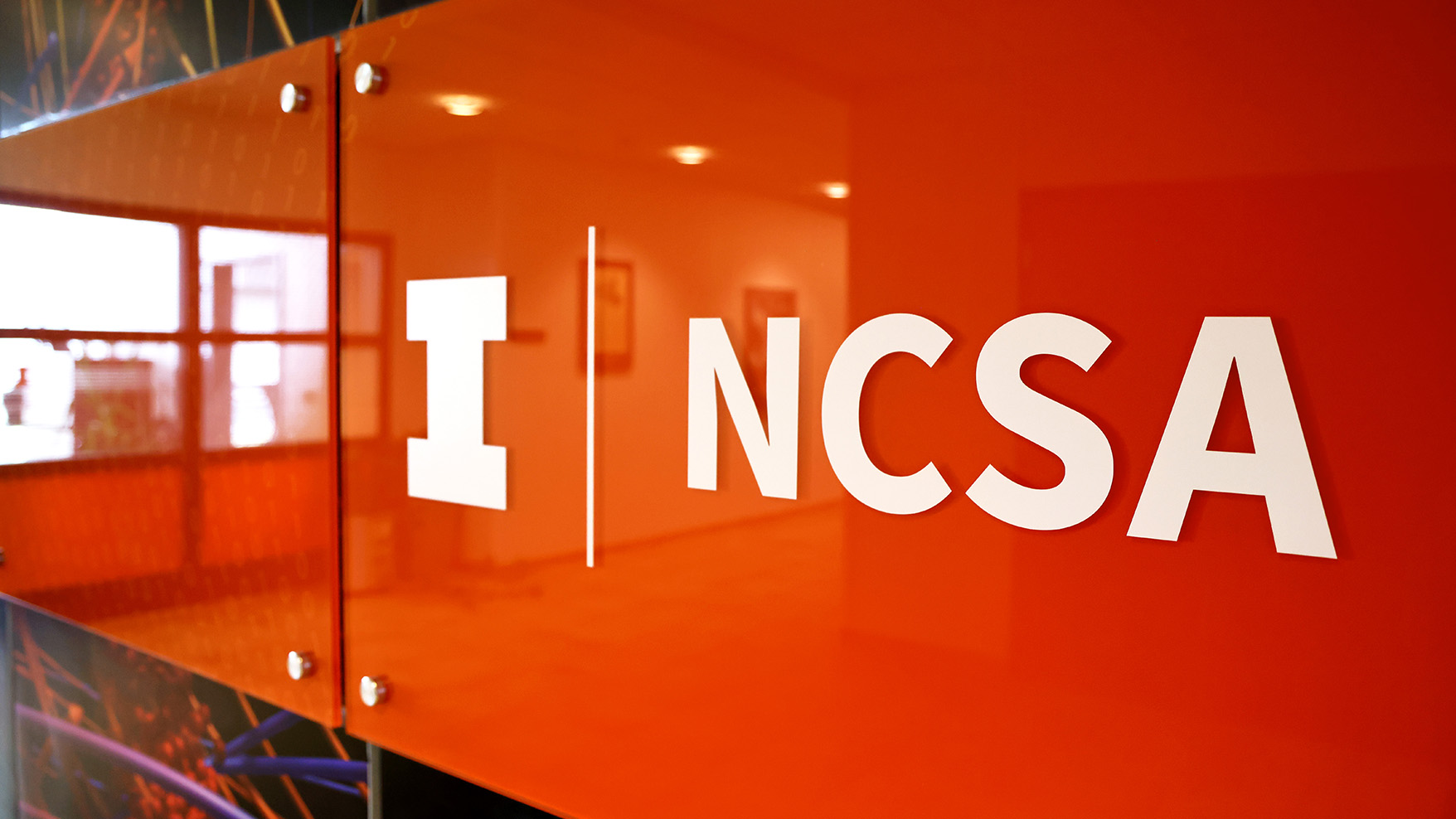A picture of NCSA's logo as it looks on a wall mural.