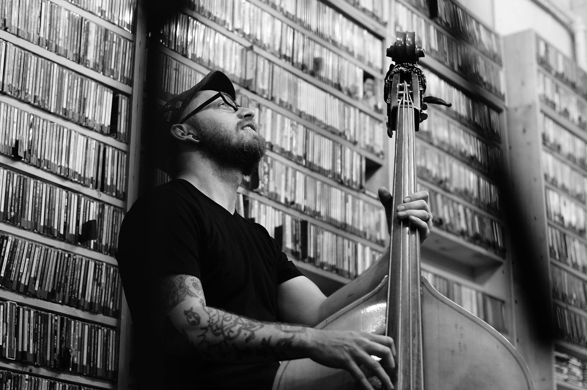 Keith Norton playing upright bass at WEFT 90.1 FM with Hot Hand Luke & the Sound.