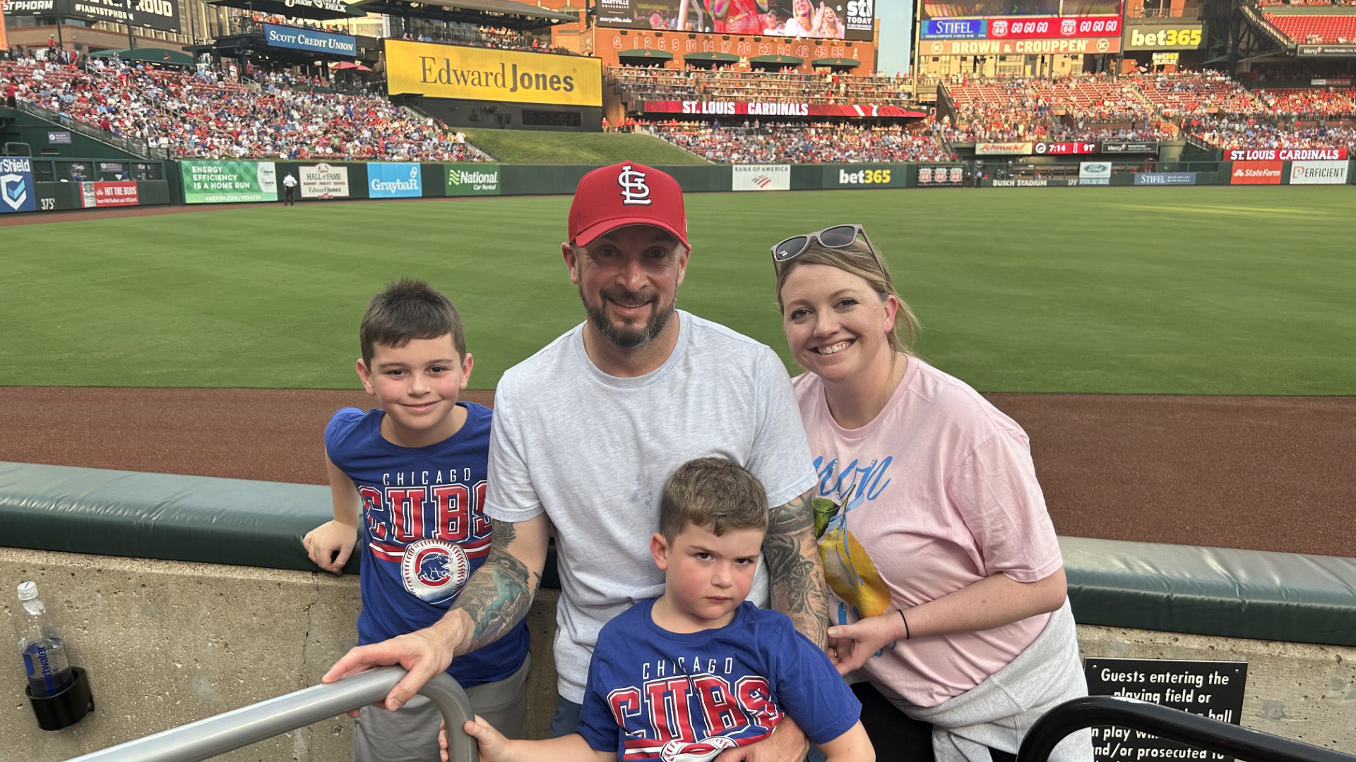Theo Long is at a baseball game with his family