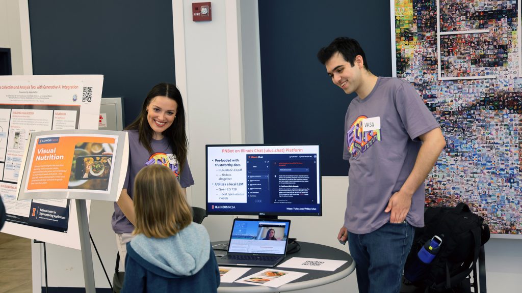 Students show their research to a young visitor