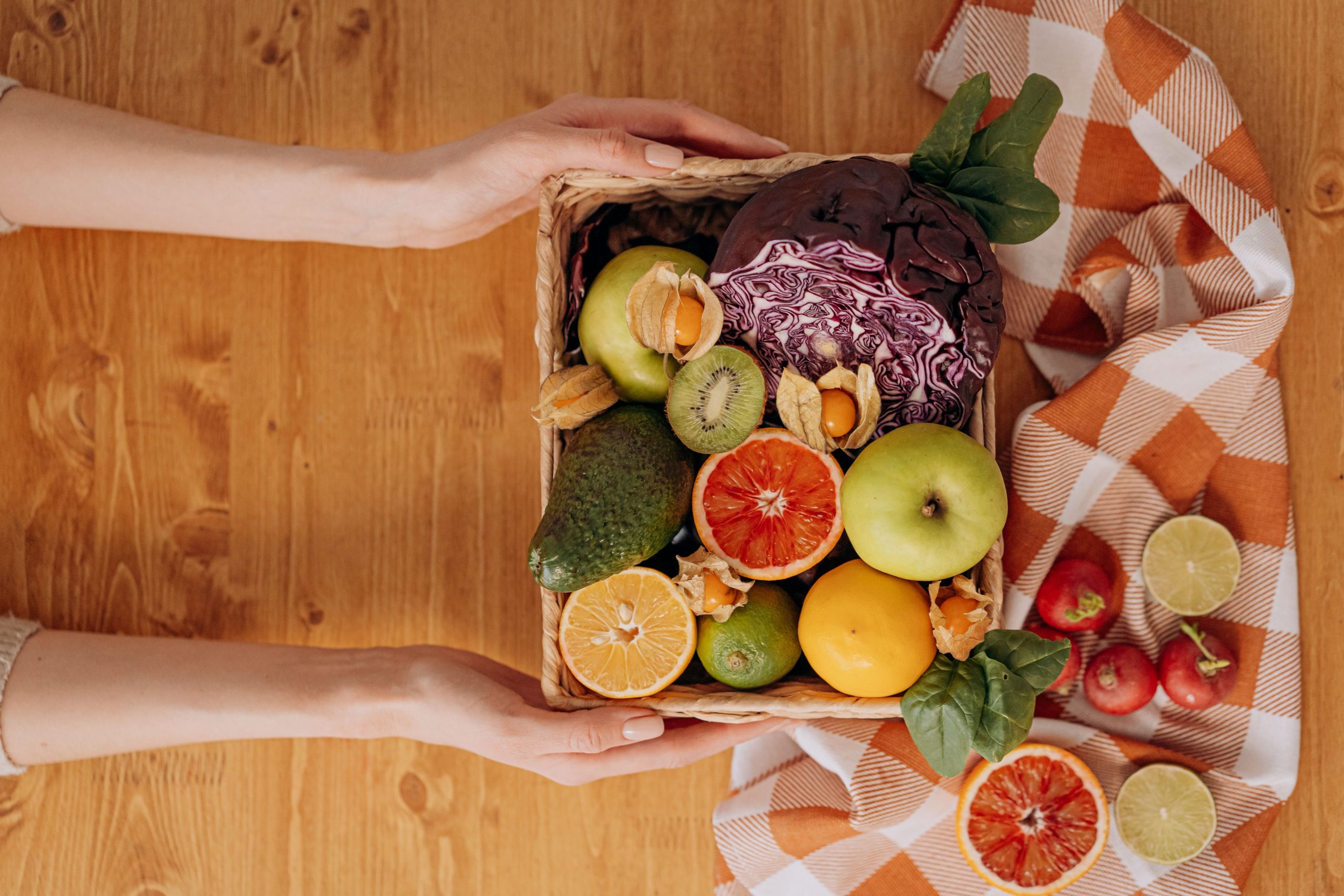 Basket of fruits and vegetables on a table